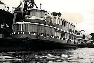 Kosciusko boarded up ready for the tow to Hobart following the collapse of the Tasman Bridge, 1975