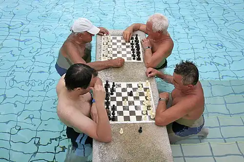 Chess players in the Széchenyi baths of Budapest, Hungary