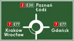 Polish road sign E-1, placed before roundabout.