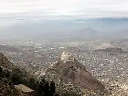 A photo shows Al-Qahirah District