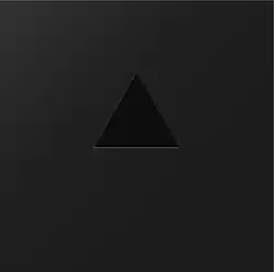 A matt-black, square box with a gloss-black triangle at the centre.