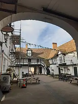 The George Hotel's courtyard, 1574 sides, through carriage arch
