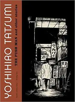 A man walks down a narrow alley full of store signs