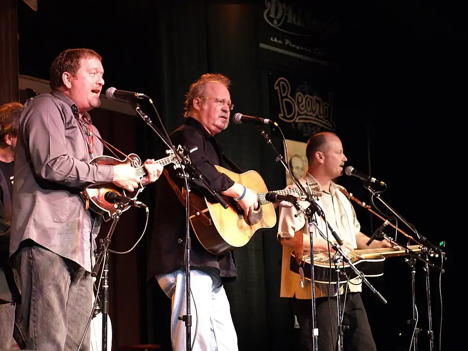 Lou Reid was the first bassist in Doyle Lawson & Quicksilver, performing on three albums.