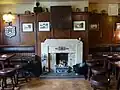 Fire place and dartboard at the Tankard Inn, Rufforth
