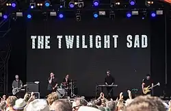 The Twilight Sad performing live at Hyde Park, London in 2018. Left to right: MacFarlane, Graham, Schultz, Smith and Docherty.