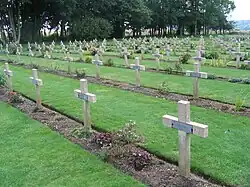 Graves of unknown French soldiers killed during World War One. Each concrete cross has a metal plaque bearing the word "Inconnu" i.e. "Unknown"