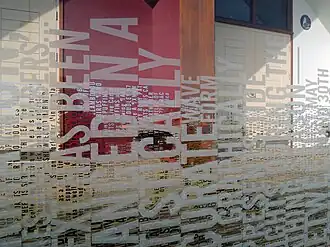Photograph of 'Tidal Word Wave' glass artwork in Bridlington by Adrian Riley and Rachel Welford