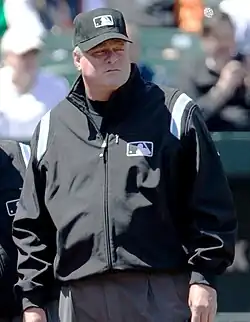 Photograph of Tim Welke as base umpire