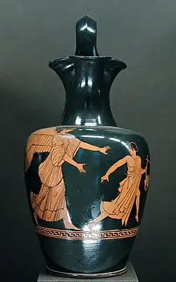 Oinochoe Shape 1, H. 22&nbsp;cm (8+1⁄2&nbsp;in), diam. 13.5&nbsp;cm (5+1⁄4&nbsp;in), Eos (Dawn) pursuing Tithonus. Attic red-figure, 470–460 BC.