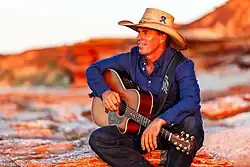 Tom Curtain an Australian singer songwriter, horseman, entrepreneur and family man