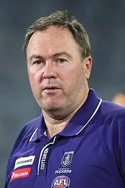 Cooper walking to address his players