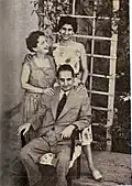 George Fteris (sitting) with his wife Rhea (left) and daughter Elyana
