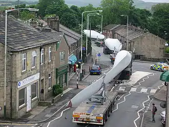 Image 20A turbine blade convoy passing through Edenfield, England (from Wind turbine)