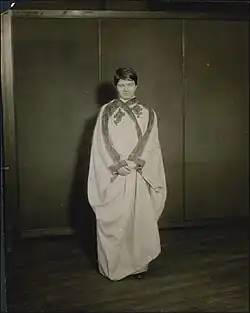 Ekrem, wearing the mashlah, the camel hair robe trimmed in Turkish embroidery