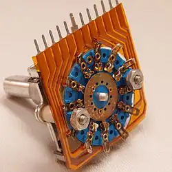 Bottom view of a 12-position rotary switch showing wiper and contacts