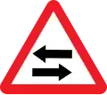 Two way Traffic on crossroads Ahead Warning