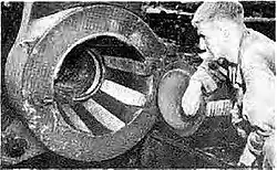 The interrupted screw breech of the gun