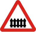 Railway crossing with gate or barrier