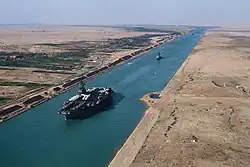 USS America (CV-66), an American aircraft carrier in the Suez Canal