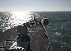 USS James E. Williams firing her 5-inch gun during an exercise on 12 January 2012.