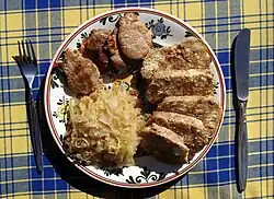 Image 32Vepřo-knedlo-zelo (roast pork with dumplings and sauerkraut) (from Czech cuisine)
