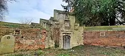 Gateway from Manor Farm to Churchyard and Attached Walls 7 Metres West of Manor Farmhouse