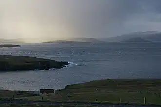 View over Yell Sound at West Yell West Yell and the Ness of Sound are in the foreground