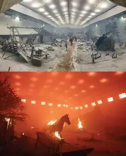 A picture of a destroyed village set in a film studio, and a picture of the same set with a red haze added through lighting and smoke effects