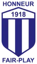 The former Violette AC crest (???–2014). A slight modification of the original crest from light blue to blue and the words Honneur and Fair-Play added.