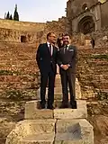 US Ambassador to Spain James Costos (left) with Mayor of Cartagena José López Martínez (politician)&nbsp;[es] (right) at the Roman Theatre during a visit to the Murcia region in November 2015