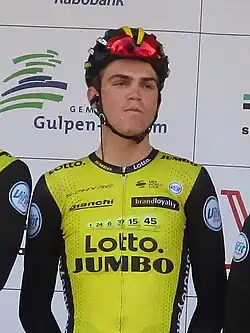 Kuss wearing a cycling jersey that reads Lotto Jumbo