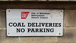 This sign found attached on Wakefield Town Hall shows the former logo and branding