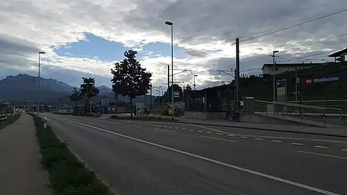 Double-tracked railway line with side platforms