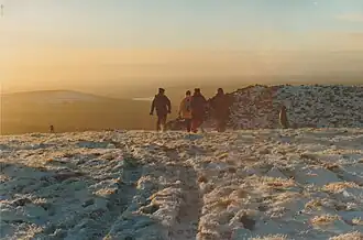 Hillwalkers approaching the tomb, midwinter 1998