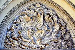 Ex Nihilo (Out of Nothing) by Frederick Hart, tympanum over center doors, Washington National Cathedral, US