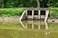 Waste weir. Note boards to adjust water height. The wicket at Pennyfield lock were open, draining the canal of water, hence, why the water level is lower than the boards.