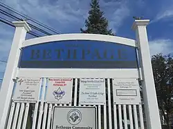 A welcome sign for the hamlet