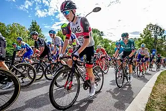Winner Tadej Pogačar in the peloton during the race