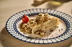 A piece of Yavoriv pie with meat and gravy