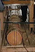 Cutting a tree trunk