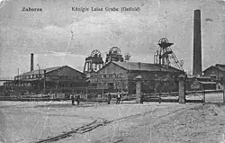 Historical black and white photograph of coal mine buildings from outside