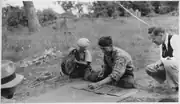 Young boys playing the moccasin game, c. 1938