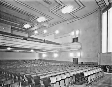 View of the seats and upstairs stalls from under the screen.